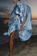 Luisa Satin Floral Print Pleated High-neck Batwing Cutout Sleeve Loose Cape Mini Dress