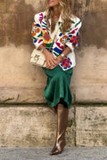 White denim overshirt embroidered with bright colors and pockets