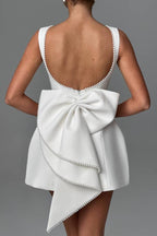 Lillian Effortless Stylish Slim Fit Mini Dress with a Large Bow and Beaded Detailing Chic Silhouette Collection
