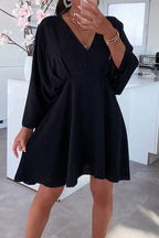 Pamela Chic Long Sleeved Dress with an Asymmetrical V Neck and Irregular Cut Evening Wear Edit