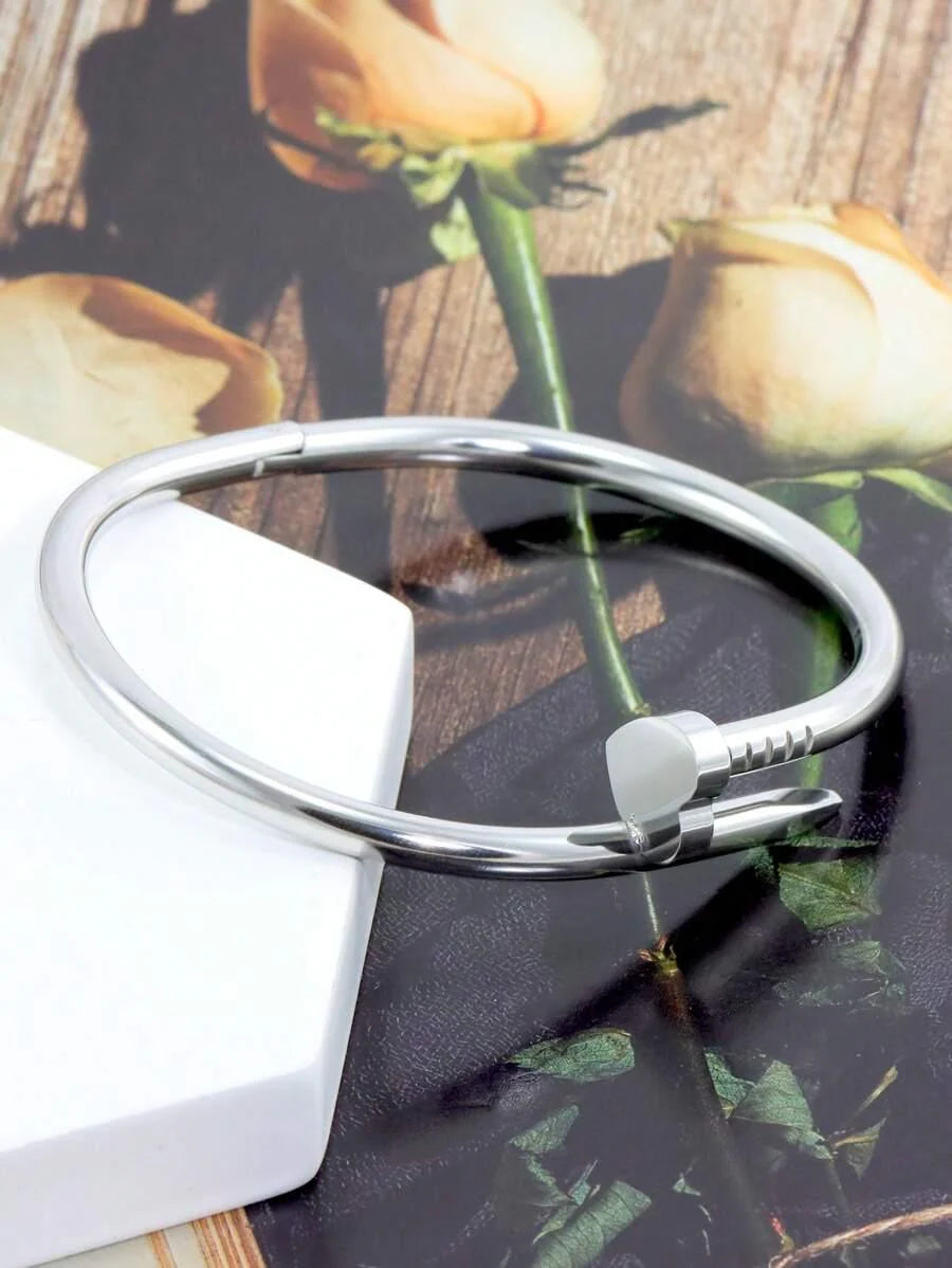 Gleaming Gold Tone Stainless Steel Four Leaf Clover Bangle