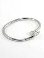 Gleaming Gold Tone Stainless Steel Four Leaf Clover Bangle