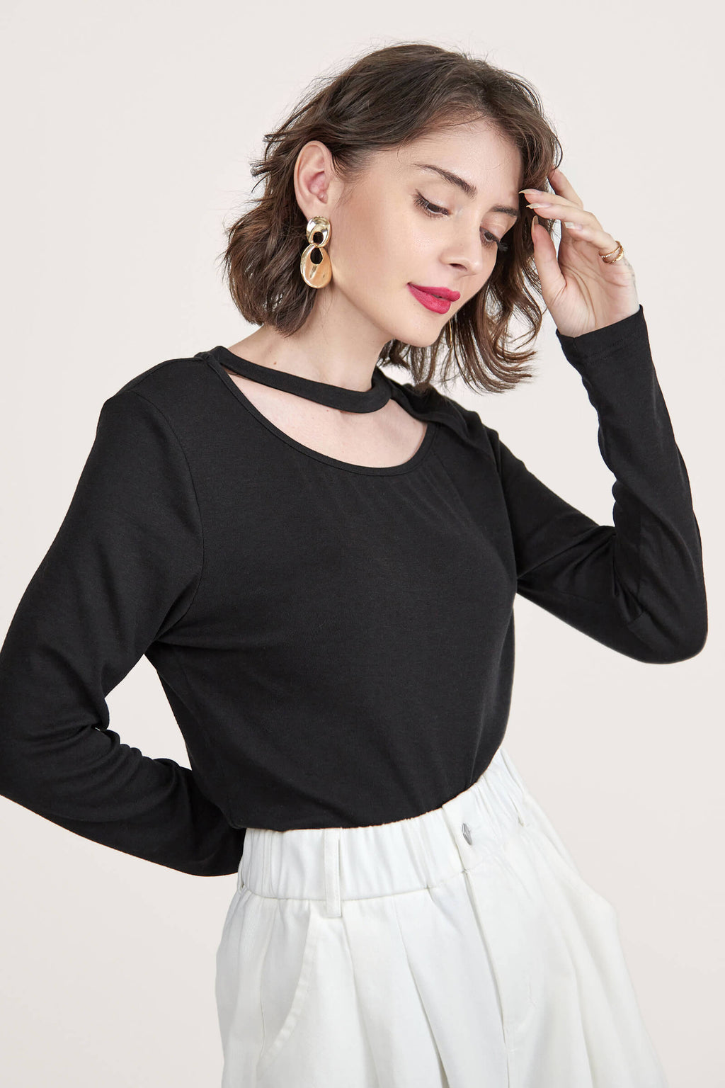 Black Long Sleeve Asymmetric Cut Out Top