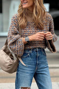 Brown and blue heathered chunky knitted turtleneck and flared sleeve sweater