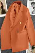 Metal-buttoned double-breasted suit jacket