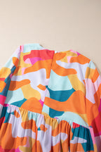 Laura Effortless Long Sleeve Mini Dress with Ruffle Hem and Color Block V Neck Statement Occasion Edit