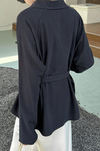 Waist Defining Plunge Neck Blouse
