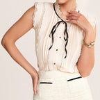 Ivory Sleeveless Ruffled Tie Neck Blouse