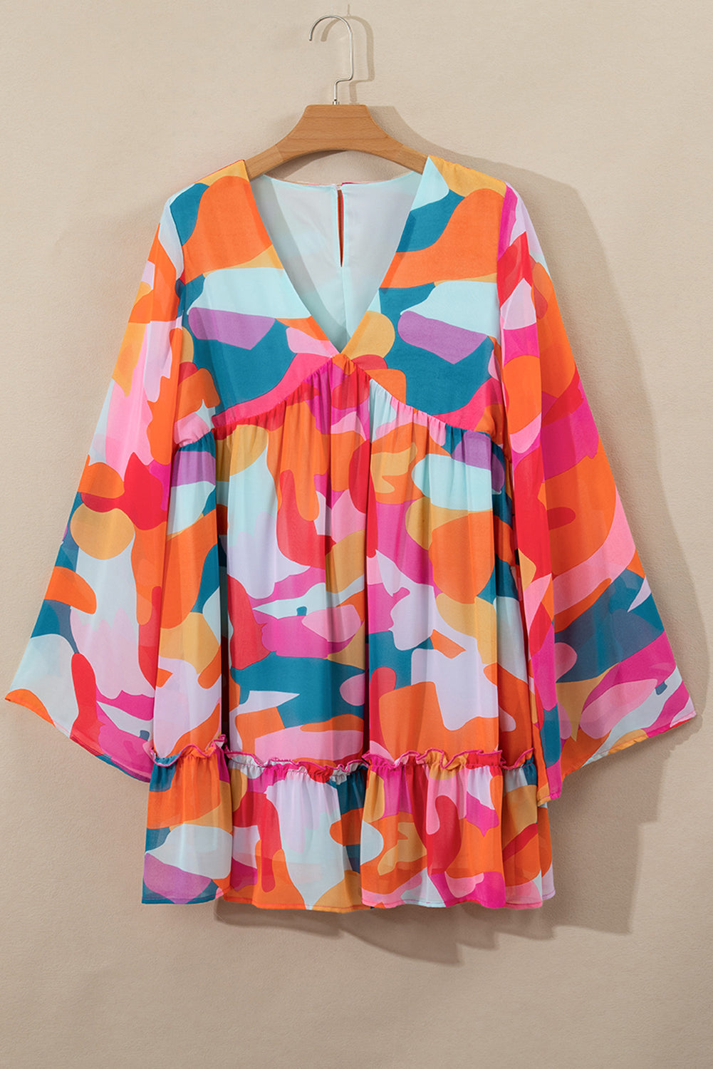 Laura Effortless Long Sleeve Mini Dress with Ruffle Hem and Color Block V Neck Statement Occasion Edit