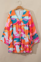 Laura Effortless Long Sleeve Mini Dress with Ruffle Hem and Color Block V Neck Statement Occasion Edit