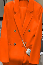 Metal-buttoned double-breasted suit jacket