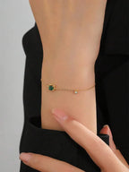 Emerald Accent Dainty Gold Bracelet