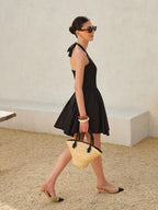 Timeless Noir Bow Tie Pleated Halter Dress