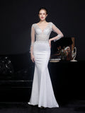 Lace long sleeved evening dress