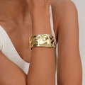 Sleek Textured Metal Spring Open Cuff Bracelet