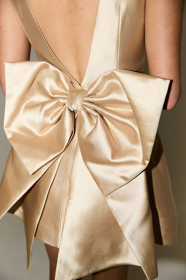 Mini waist cinching sexy satin oversized bow detail square neck mini dress