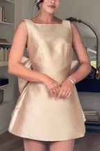 Mini waist cinching sexy satin oversized bow detail square neck mini dress