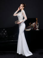 Lace long sleeved evening dress