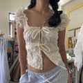 Mora Eyelet Tie-Front Blouse