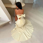 Strapless ruffled slit dress