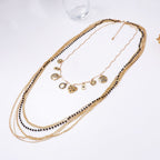 Layered Bead Chain Geometric Charm Statement Necklace