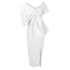 Dress With A Large Bow Slit