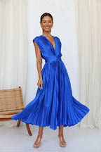 Olivia Statement Long Dress with Deep V Neckline and Bow On the Back Boutique Collection