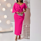Dress With A Large Bow Slit