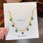 Green crystal metal braided mesh pendant necklace