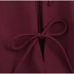 Hollow Out Bow Solid Sleeveless Pleated Dress