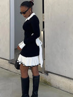 Ruffled Contrast Bow Open Back Lace - Up Knit Mini Dress