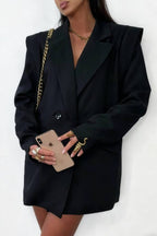 Wide-shouldered tailored suit jacket