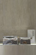 Mini clutch bag with metallic hardware