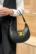 Retro metal buckle crescent bag