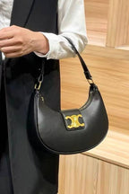 Retro metal buckle crescent bag