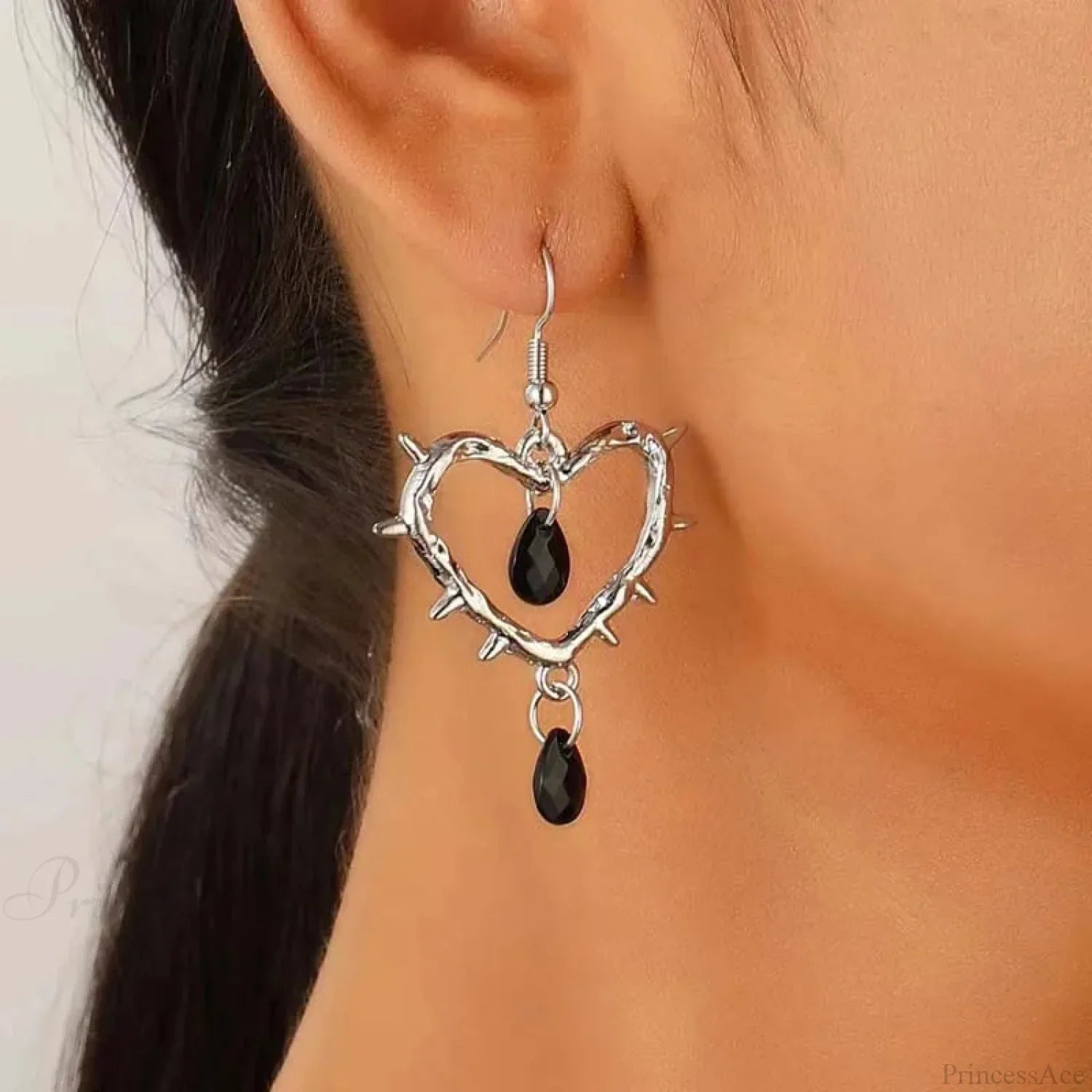 Dark Spiky Ebony Flow Oil Love Earring
