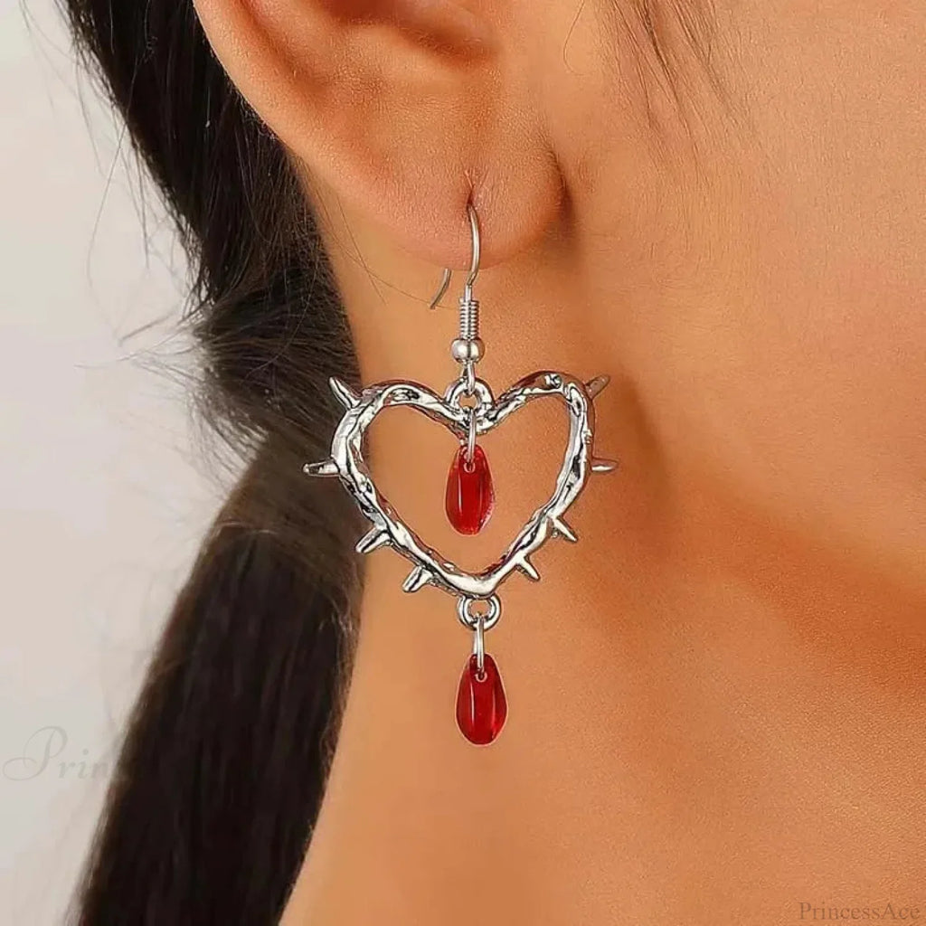 Dark Spiky Ebony Flow Oil Love Earring