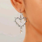 Dark Spiky Ebony Flow Oil Love Earring