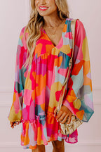 Laura Effortless Long Sleeve Mini Dress with Ruffle Hem and Color Block V Neck Statement Occasion Edit