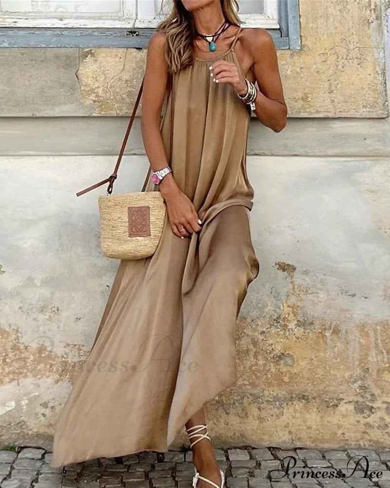 Elegant Sleeveless Dress in Solid Color