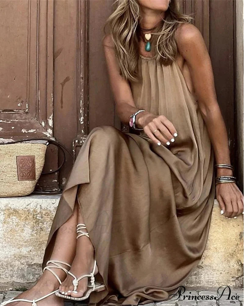 Elegant Sleeveless Dress in Solid Color