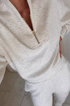 Half-zip sweatshirt and cropped pants set