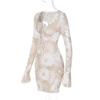 Long sleeve v neck ruffle self tie abstract mini dress