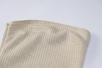 Sleeveless solid textured zip-up backless tube dress