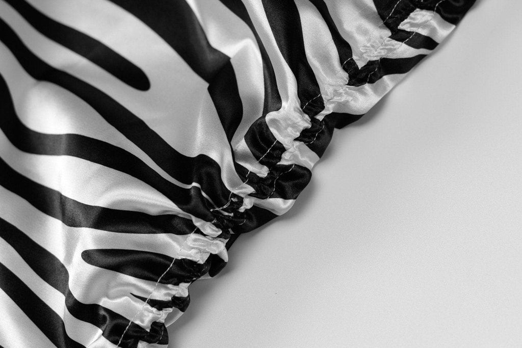 Cowl neck cross back zebra printed dress